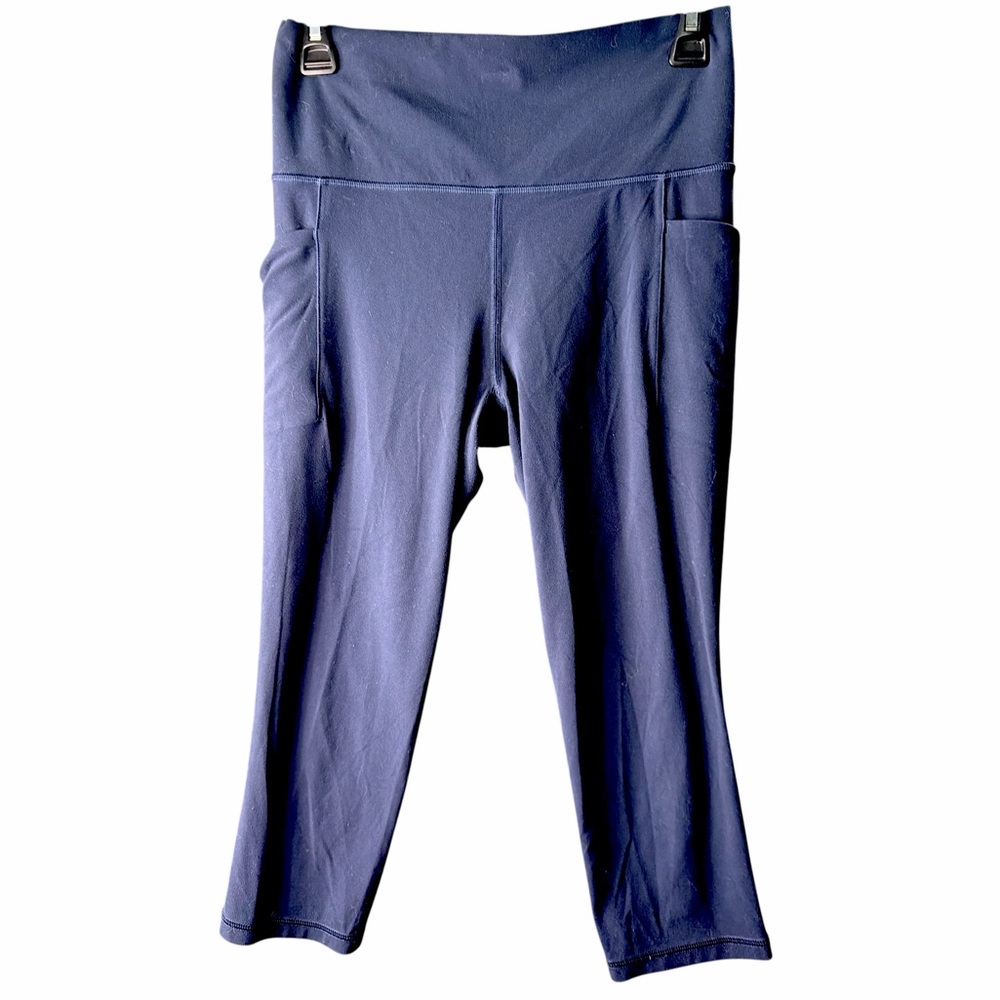 Athleta Navy Salutation Stash Pocket Leggings. EC size medium
